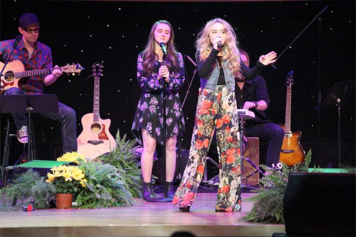 Sabrina Carpenter singing live at Disney Social Media Moms Celebration at Disneyland